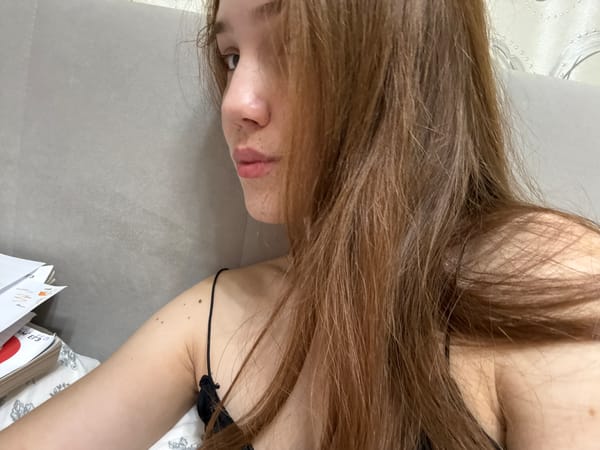 Woman takes selfie session at home in Naberezhnye Chelny