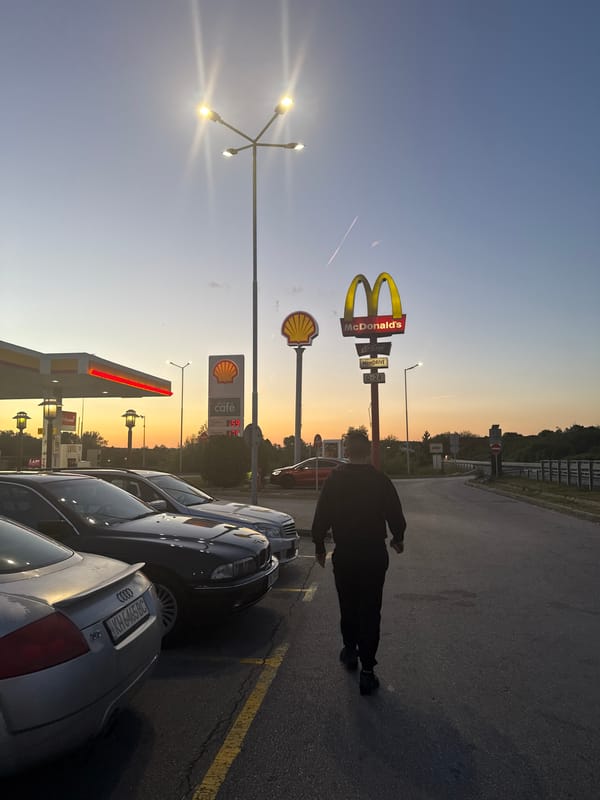 Evening pedestrian activity near commercial area in Studena, Bulgaria