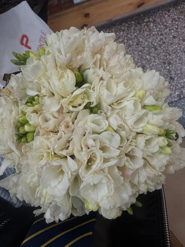 Fresh flowers and produce gathered in Yerevan morning scene