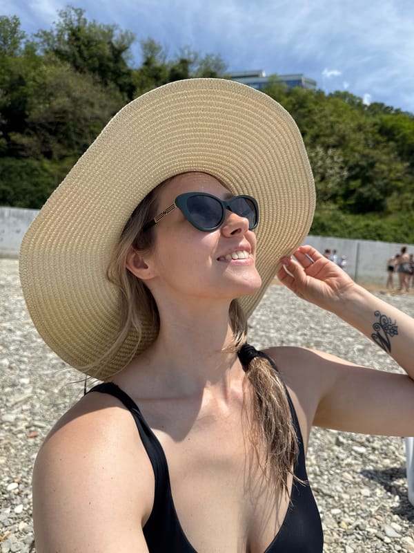 Woman enjoys beach day in Nebug, Russia