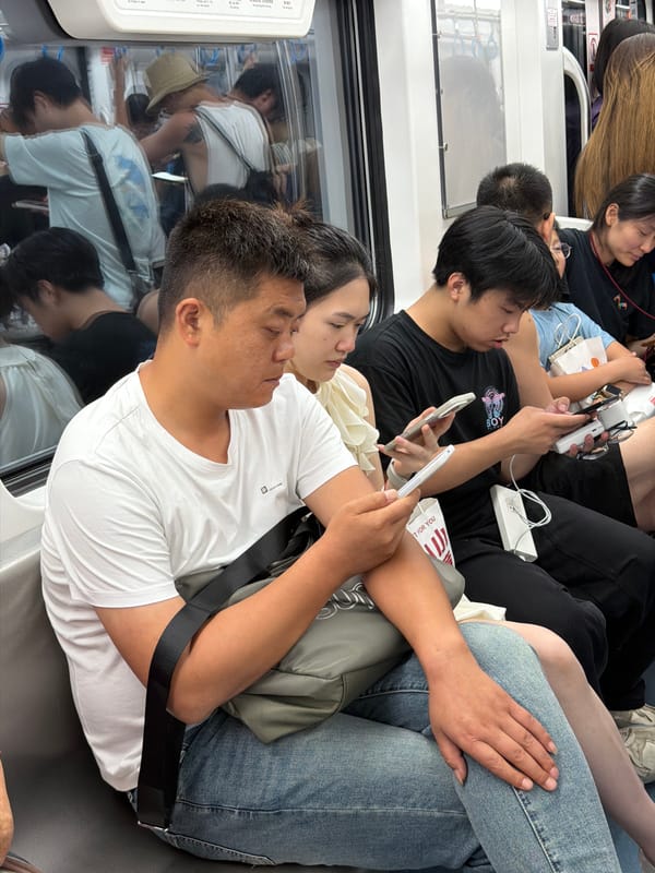 Crowded subway car documented by passengers during morning commute