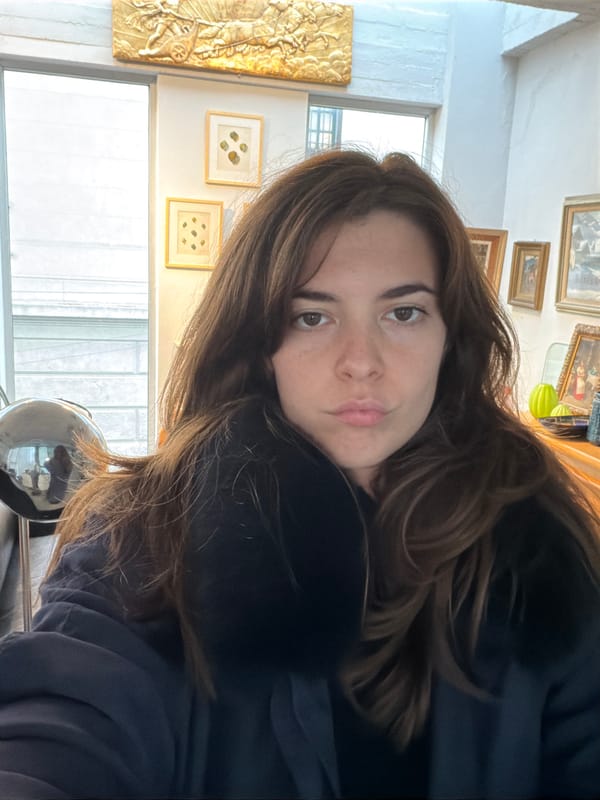 Woman dines among antiques in Buenos Aires San Telmo