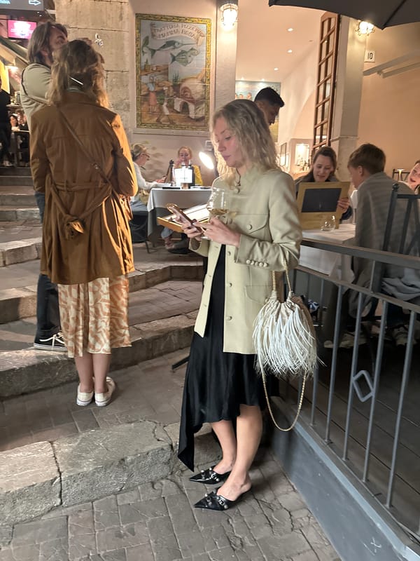 Evening dining scene captured in Taormina, Italy