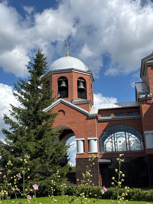 Morning stop at a Saint Petersburg Orthodox church with flowers