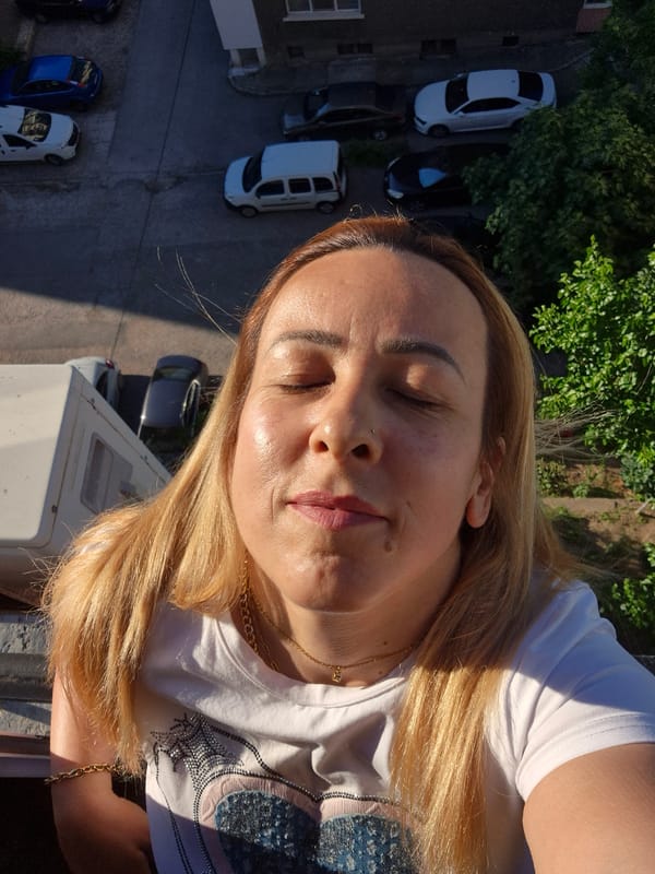 Selfie session outside apartment building