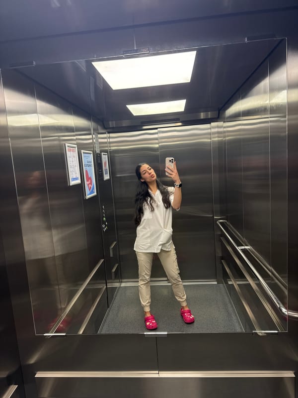 Woman takes selfie in Sofia elevator mirror