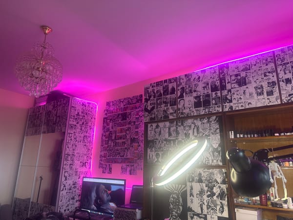 Pink-lit fashion studio documented in Moscow morning session