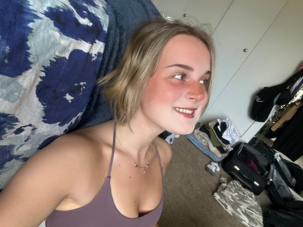 Blonde woman photographed in two poses in Whistler room