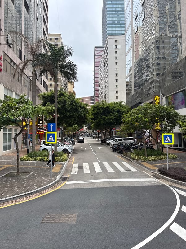 Morning street activity documented in Macau urban district