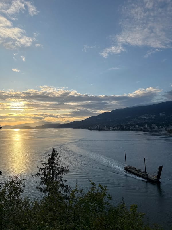 Vancouver waterfront and Lions Gate Bridge documented at sunset