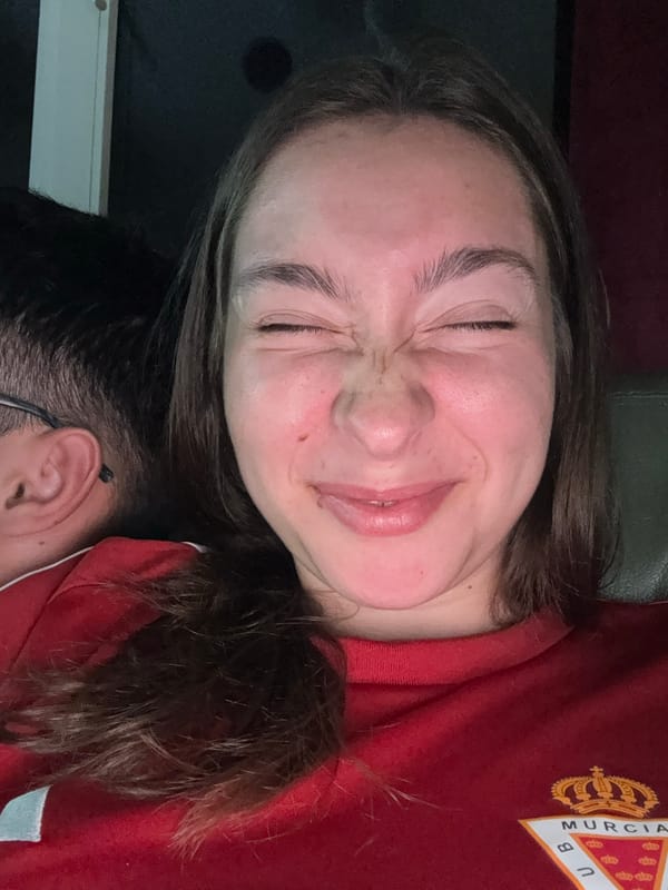 Couple watches soccer, takes playful selfies during tournament evening