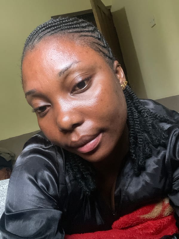 Woman photographed in intimate morning portraits in Jos, Nigeria