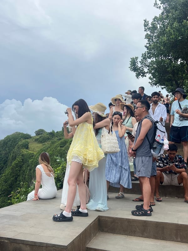 Tourists gather at iconic Kelingking Beach viewpoint in Nusa Penida