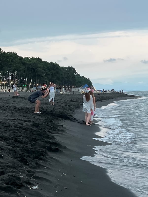 Late afternoon at Ureki's black sand beach on the Black Sea