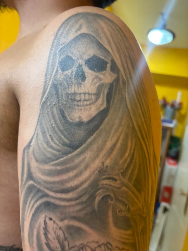 Tattoos, a sleepy dog, and Bad Bunny merch in Madrid