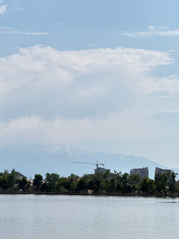 Calm lakeside scene in Yerevan with active water aeration