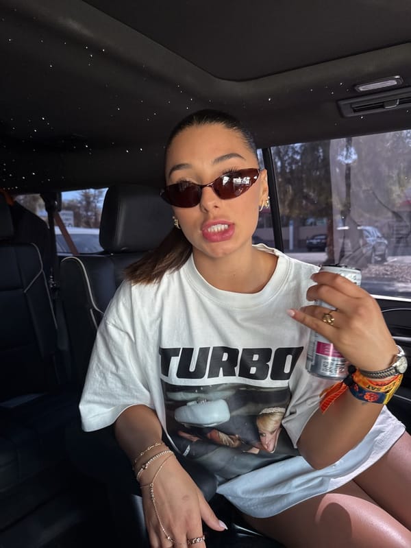 Woman photographed in car backseat late evening April 19