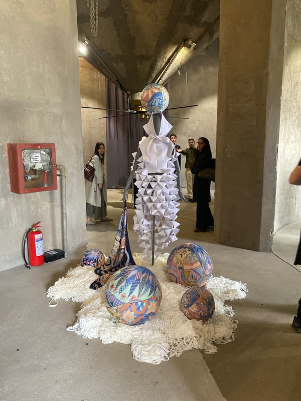 Art exhibition featuring installations and fashion displays in Belgrade