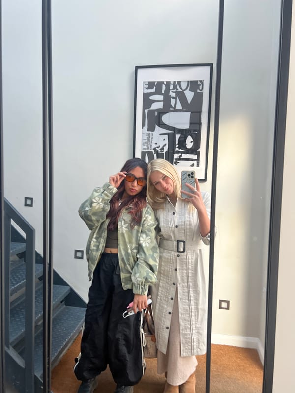 Two women take mirror selfie in London