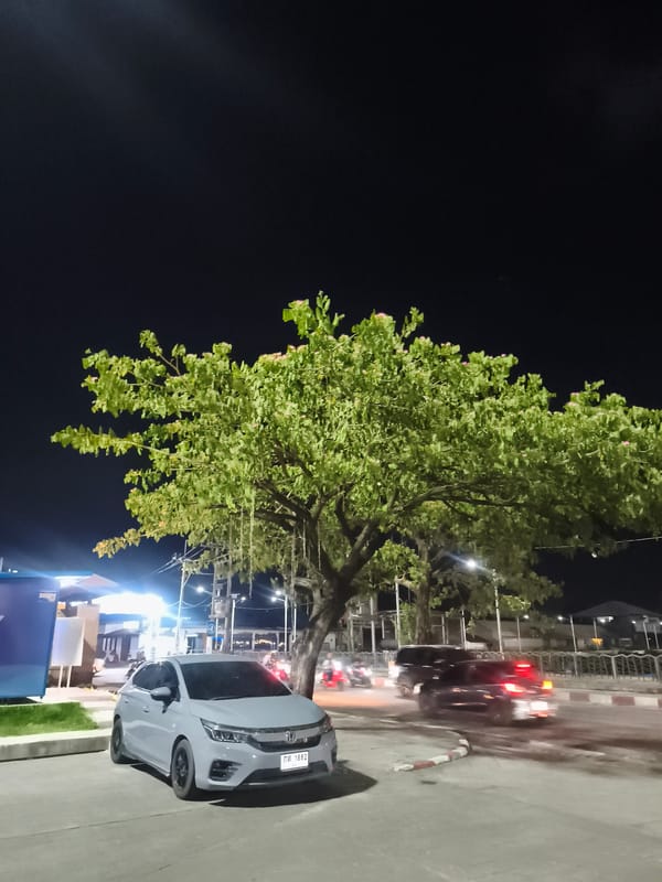 Nighttime sports court activities captured in Thailand