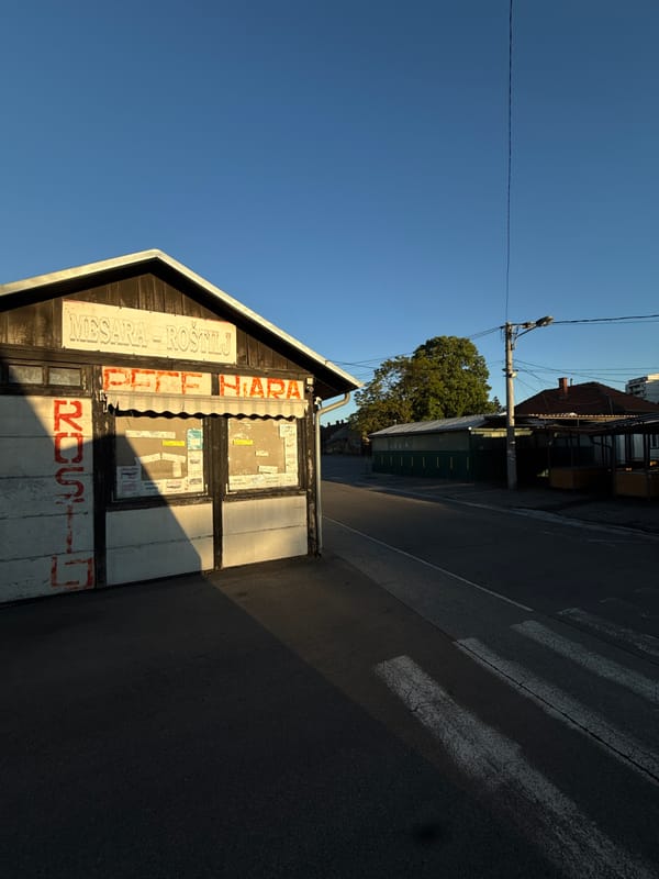 Evening scenes captured in Vozdovac: local shop and highway traffic