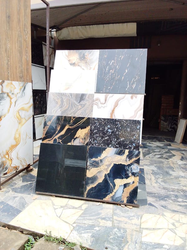 Tile display and street life documented in Umuode Nigeria