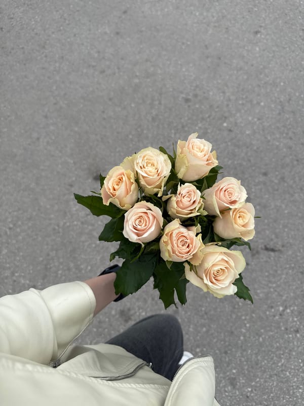 Young woman receives flowers, dines in Perm restaurants