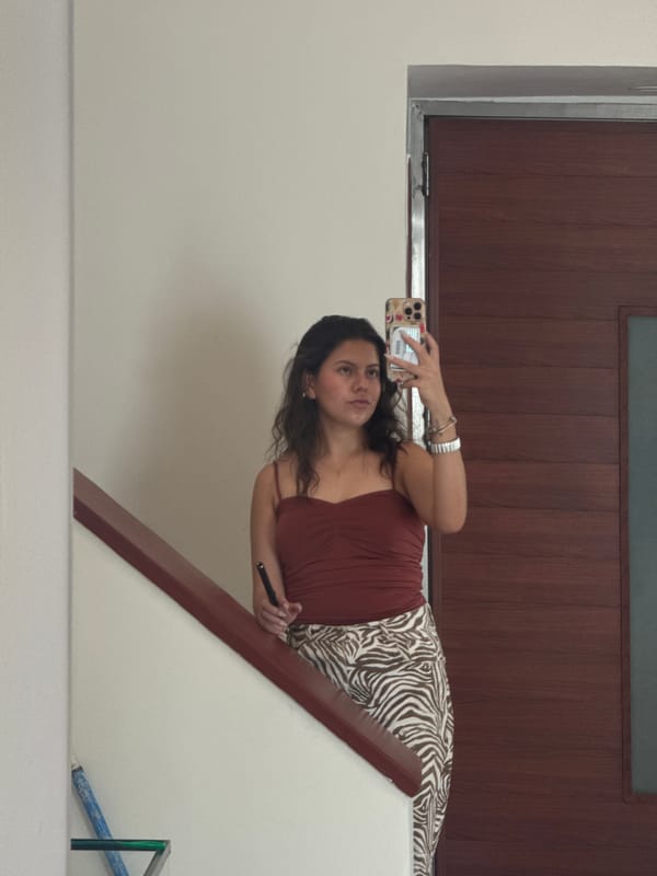 Woman Takes Selfies in Puebla Stairwell