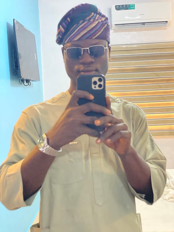 Man Takes Extended Selfie Session in Traditional Attire, Badagry