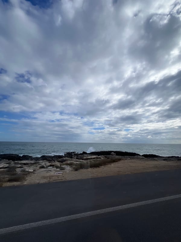 Morning coastal scenes captured along Bari waterfront road