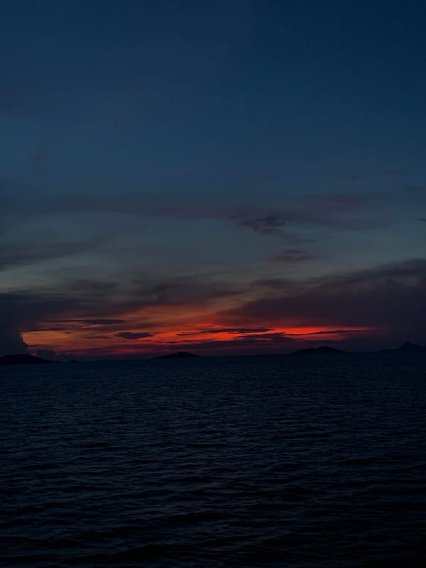 Sunset observed over waters in Thong Nian, Thailand