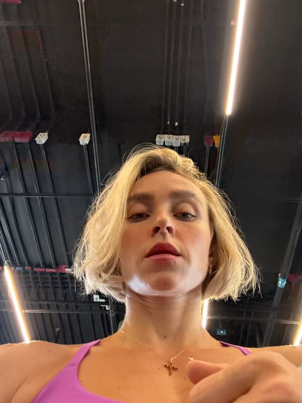 Woman documents workout session at Rawai gym with selfies