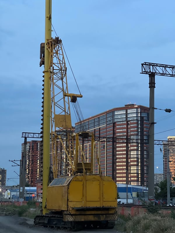Kuban Stadium and surrounding construction zone at dusk, Krasnodar