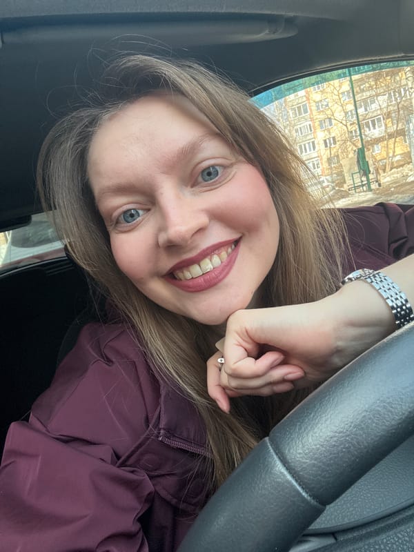 Woman takes selfie in driver's seat in Izhevsk