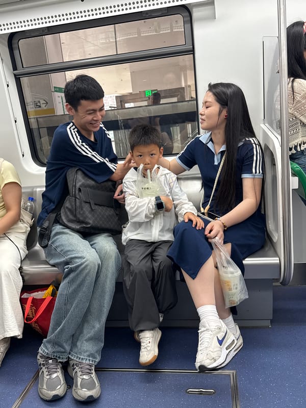 Three passengers ride subway train in Longta, China