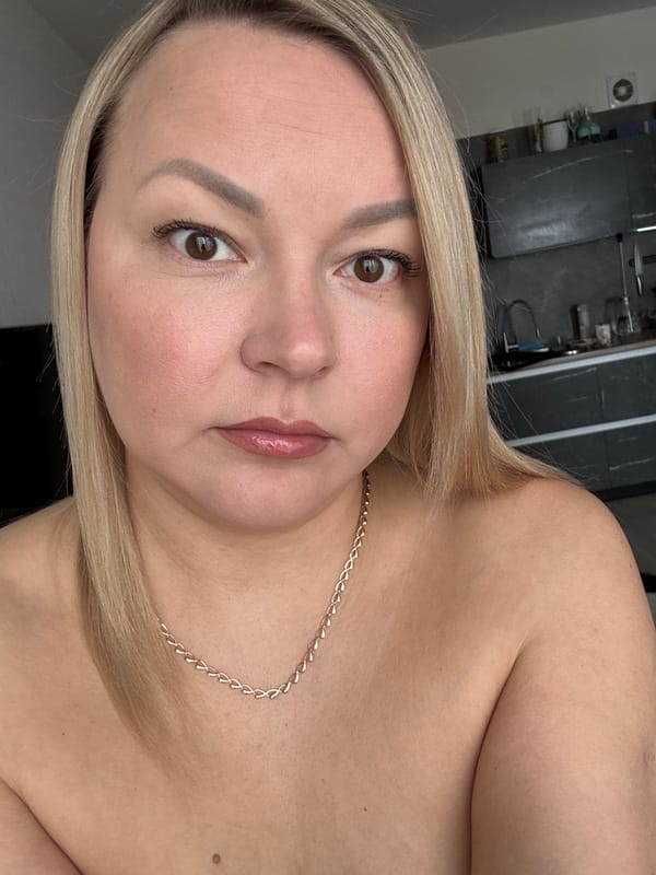 Woman takes multiple selfies in apartment in Izhevsk