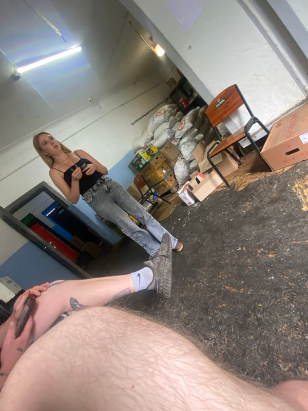 Casual hangout near a loading dock with dogs around