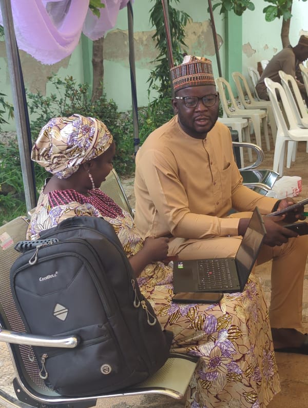 Traditional outdoor gathering and street life in Kaduna, Nigeria