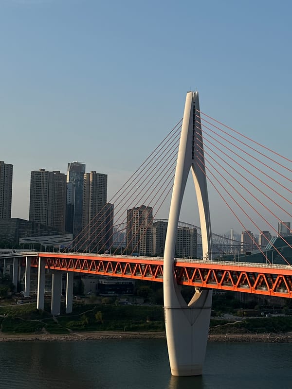 Tourist documents Chongqing landmarks during morning walkabout in Yuzhong District