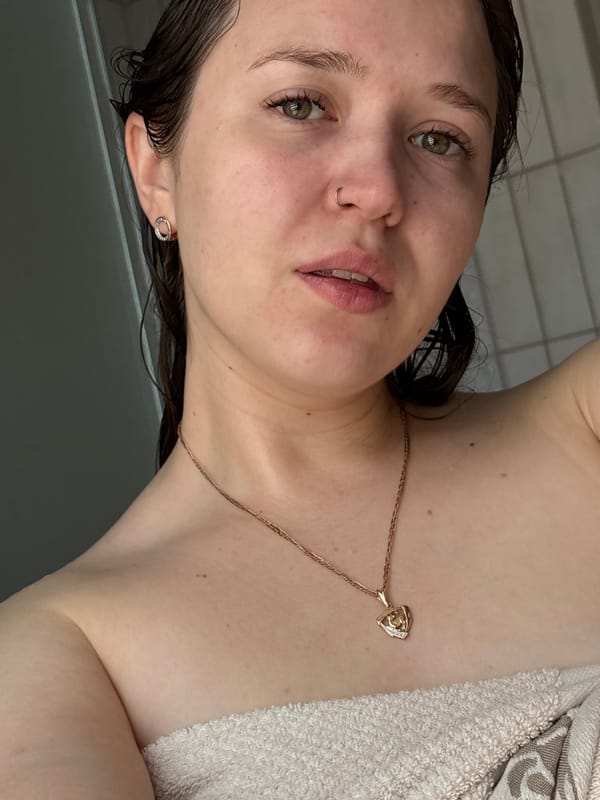 Woman photographed in casual morning portraits with cat in Izhevsk