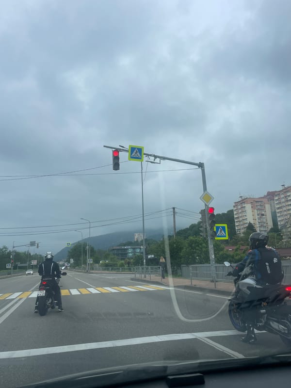 Street scene photographed from vehicle in Sochi, Russia