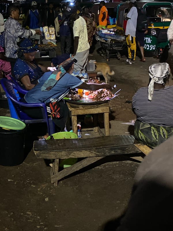 Night market bustles with food vendors in Bukuru, Nigeria