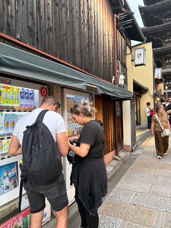 Tourist documents morning walk through historic Kyoto districts