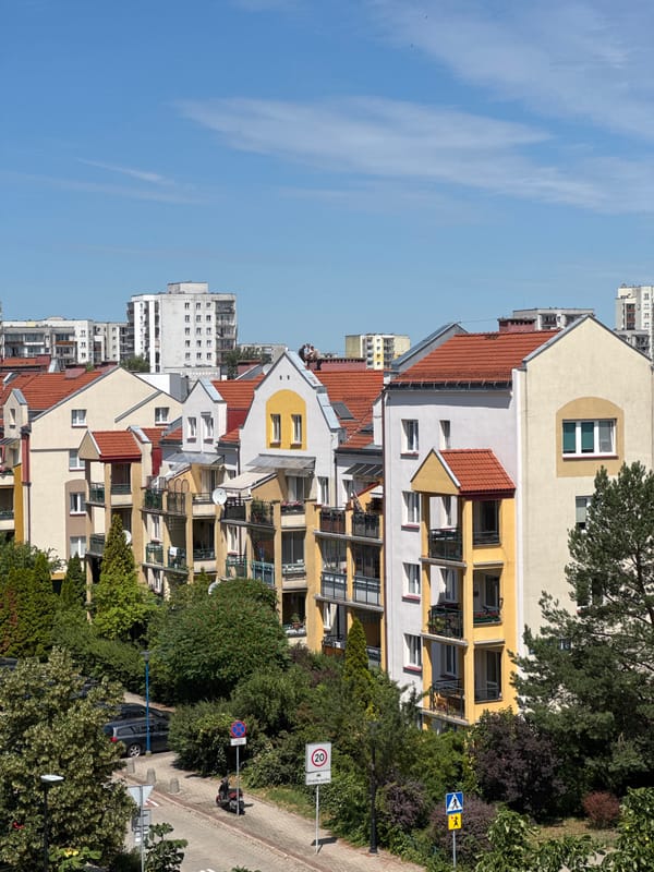 Rooftop moment above a Warsaw residential block