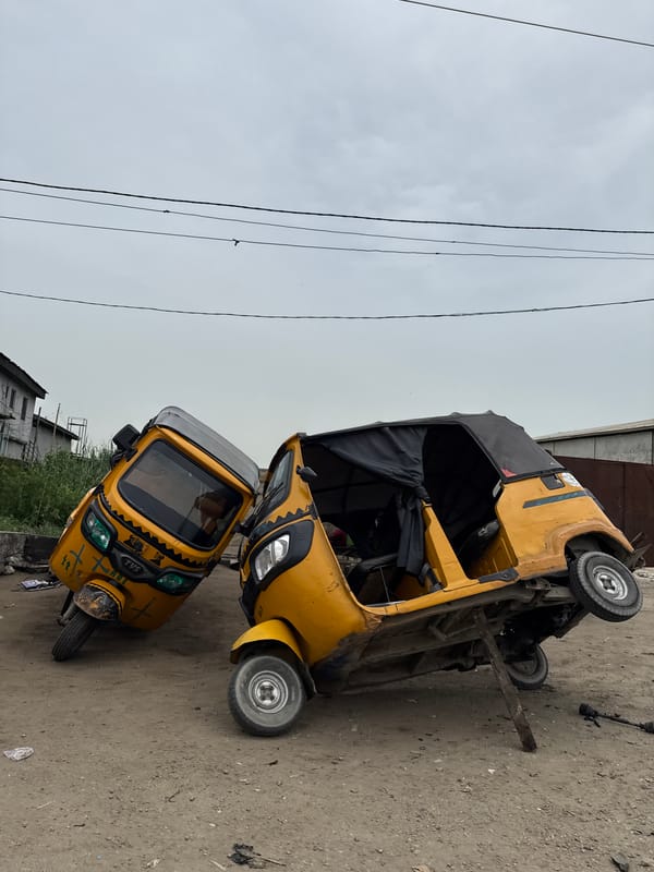 Daily life moments captured in Ado: overturned keke, sugar cane vendor