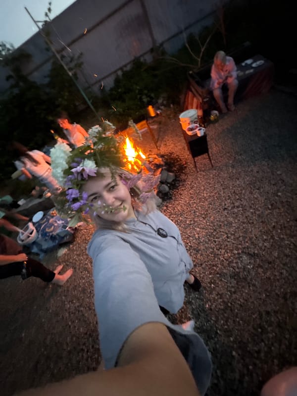 Floral crown selfies by a bonfire in Birobidzhan