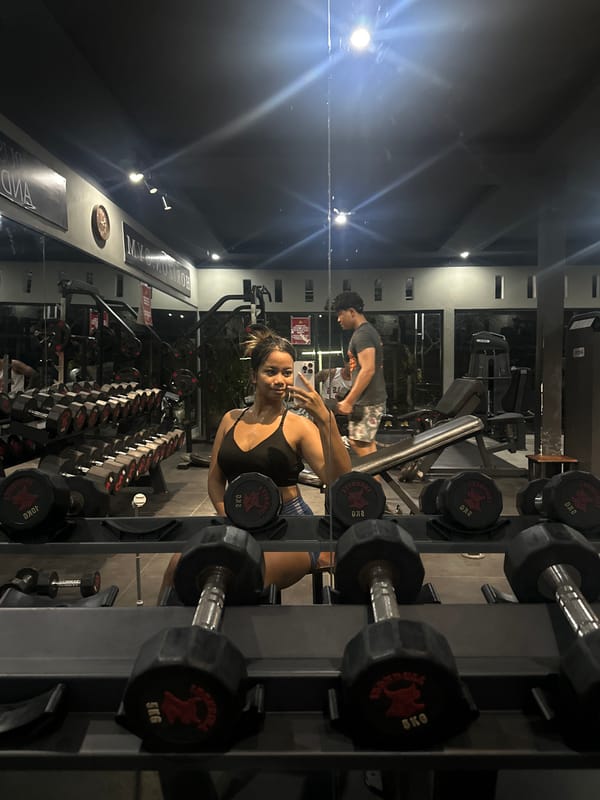 Gym activity documented in Sukawati, Indonesia during afternoon workout session