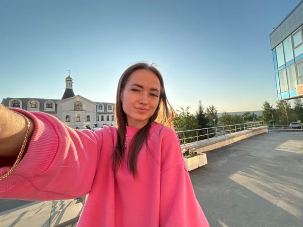 Selfie session in an urban park at golden hour