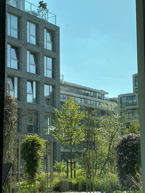 Amsterdam resident documents sunny urban architecture and digital display