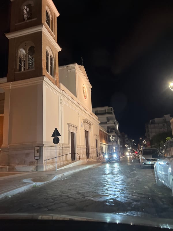 Evening drive through Margherita di Savoia's wet streets